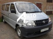 Передний салон,  правое окно на Toyota Hiace